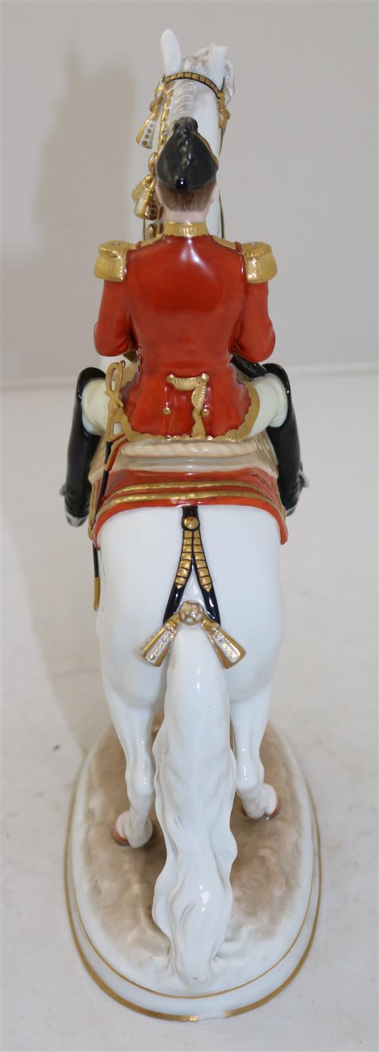 An Augarten Austria Spanish Riding School group, modelled by Dobrich, 28cm, loss to ear